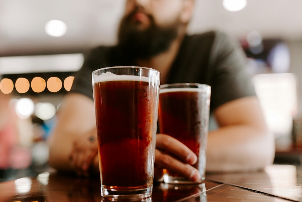 A couple enjoying beers in Kauai, Hawaii. A couple enjoying beers in Kauai, Hawaii.